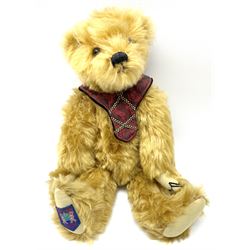 Four Merrythought teddy bears - International Collectors Club limited edition with growler mechanism No.71; plain brown with back-wind musical movement; golden brown dressed as a Beefeater; and earlier light golden coloured (4)