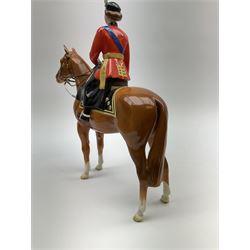 A Beswick model of HM Queen Elizabeth II mounted on Imperial Trooping the colour 1957, model no 1546, H26.5cm.