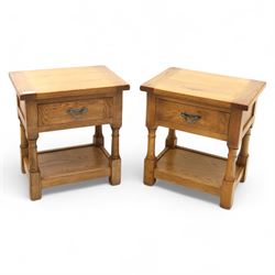 Old Charm - ‘Chatsworth’ pair of light oak lamp tables, each with moulded rectangular top, single drawer and metal drop handle, raised on turned supports joined by undertier shelves