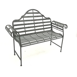 Distressed metal bench, shaped back and scrolled arms, W135cm,   