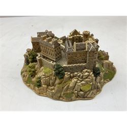 Four Lilliput Lane models from the 'Britain's Heritage' collection, comprising Edinburgh Castle, The World Famous Blacksmith's Shop Gretna Green, Shakespeare's Birthplace and Mickelgate Bar York, together with  a Lilliput Lane Beatrix Potter Hill Top model, all boxed