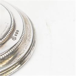 Pair of late 20th century silver mounted candlesticks, of tapering form with beaded rims, hallmarked Cooper Brothers & Sons Ltd, Sheffield 1972, H20cm