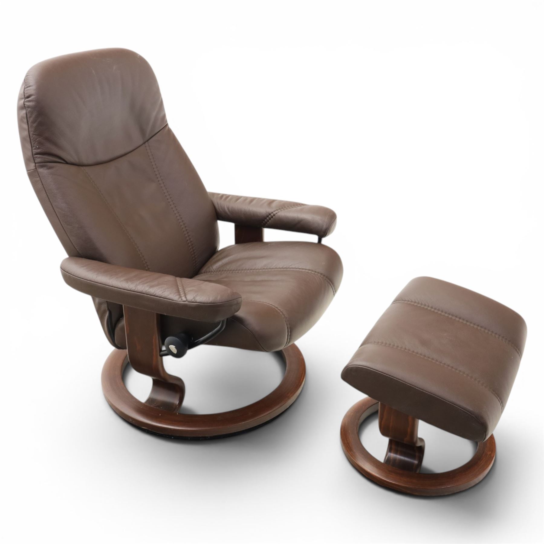 Ekornes - Stressless medium brown leather recliner swiveling armchair and stool, brown leather recline with stitching, together with a matching stool, on a round base