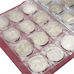 Folder containing various Chinese coins 