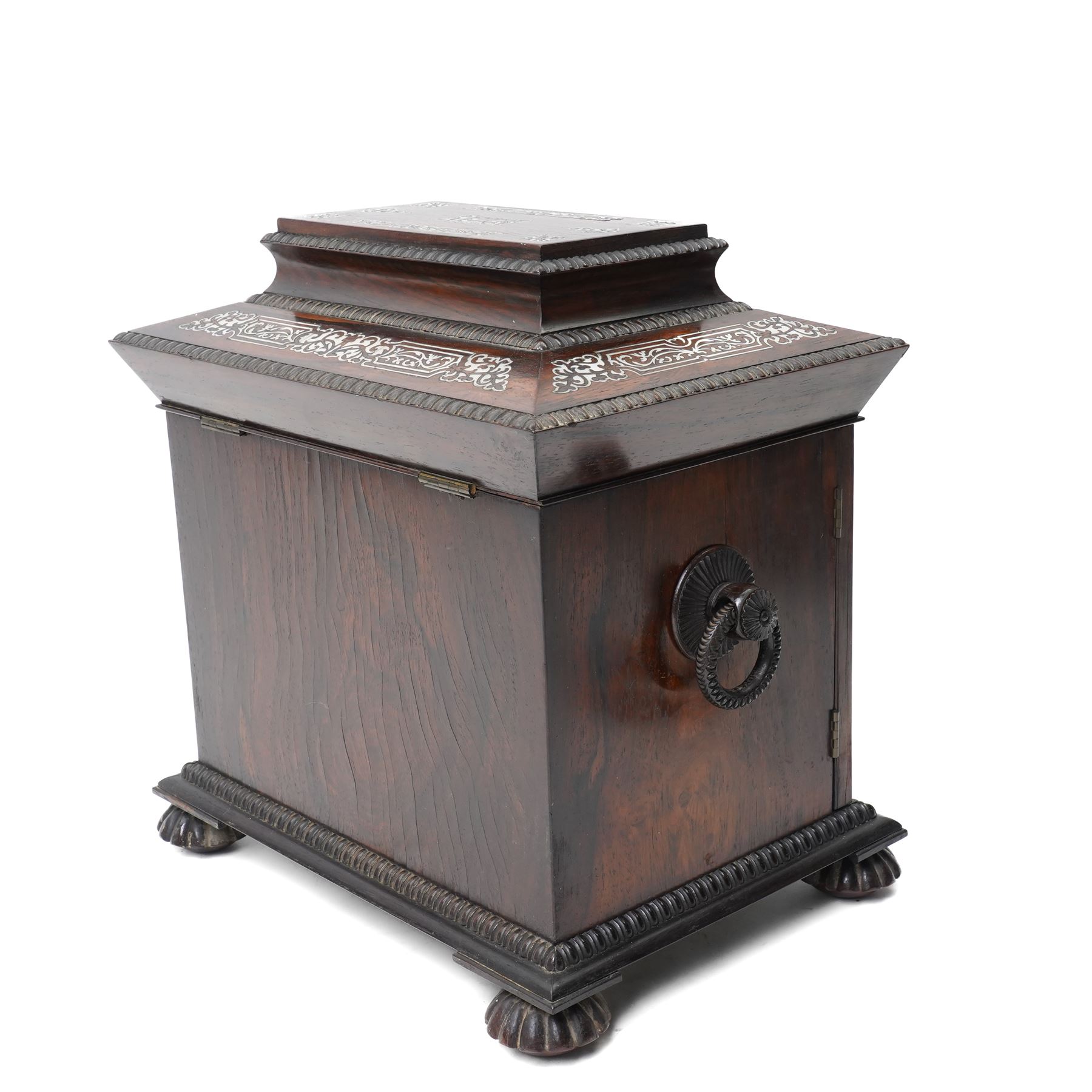 Early Victorian rosewood and mother of pearl inlaid sewing, jewellery, and writing casket  with hinged lid, the upper section fitted for sewing implements, above four drawers, the bottom drawer with writing slope and on compressed fluted feet H36cm x W34cm