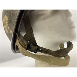 American first type paratrooper helmet with post-WW2 strap and D-rings and later 1944 liner bearing Firestone Tyre and Rubber Company mark; green textured finish