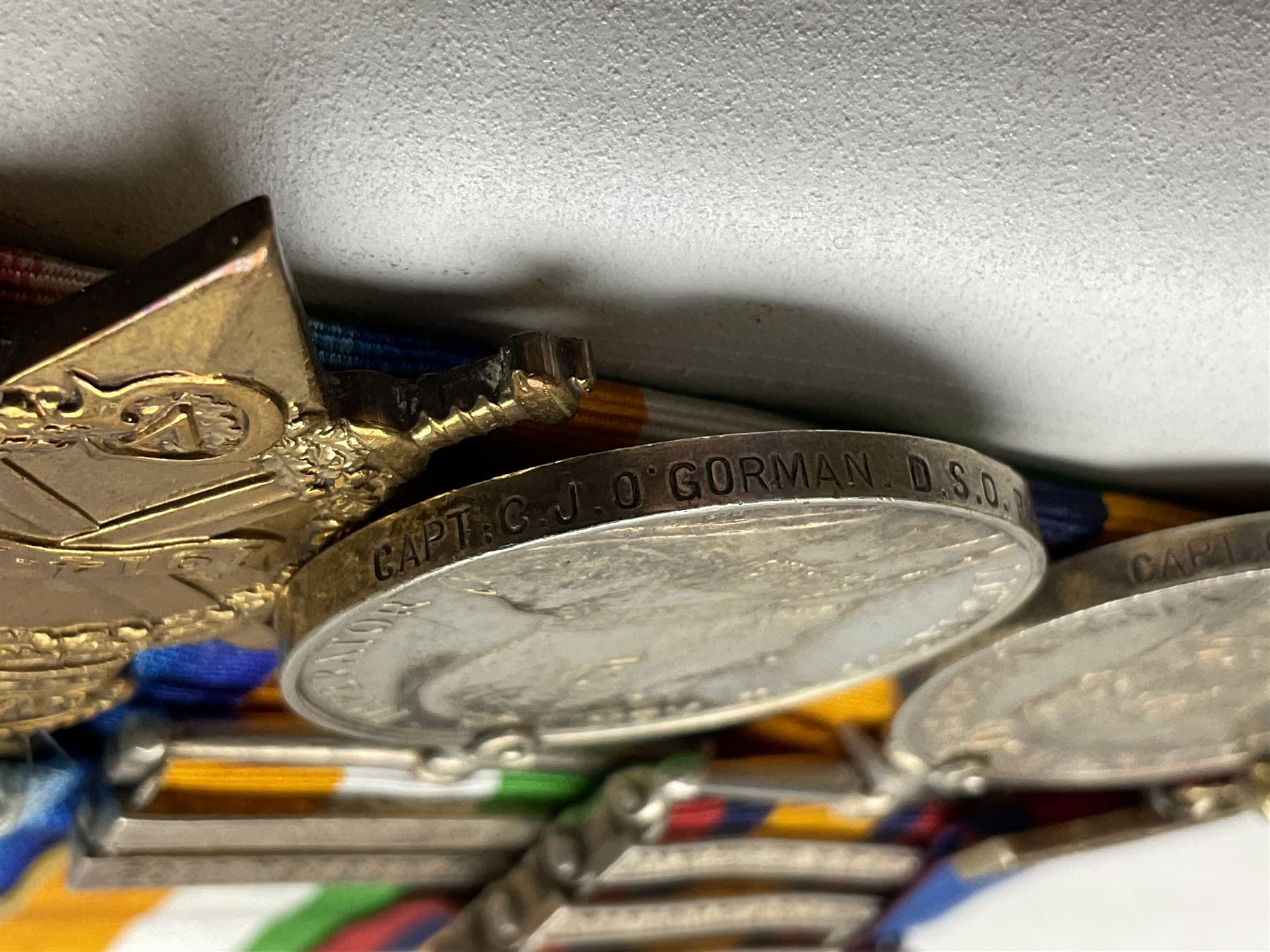 South Africa/WW1 Distinguished Service Order group of seven medals comprising D.S,O. with original ribbon bar and top bar slider, Queens South Africa Medal with three clasps for Defence of Kimberley, Orange Free State and Transvaal, Kings South Africa Medal with two clasps for South Africa 1901 & 1902 awarded to Capt. C.J. O'Gorman D.S.O. R.A.M.C., 1914-15 Star, British War Medal and Victory Medal with MID oak leaves awarded to Major (later Lt. Col.) C.J. O'Gorman D.S.O. R.A.M.C. and Kimberley Star 1899-1900; together with copies of research and biographical material