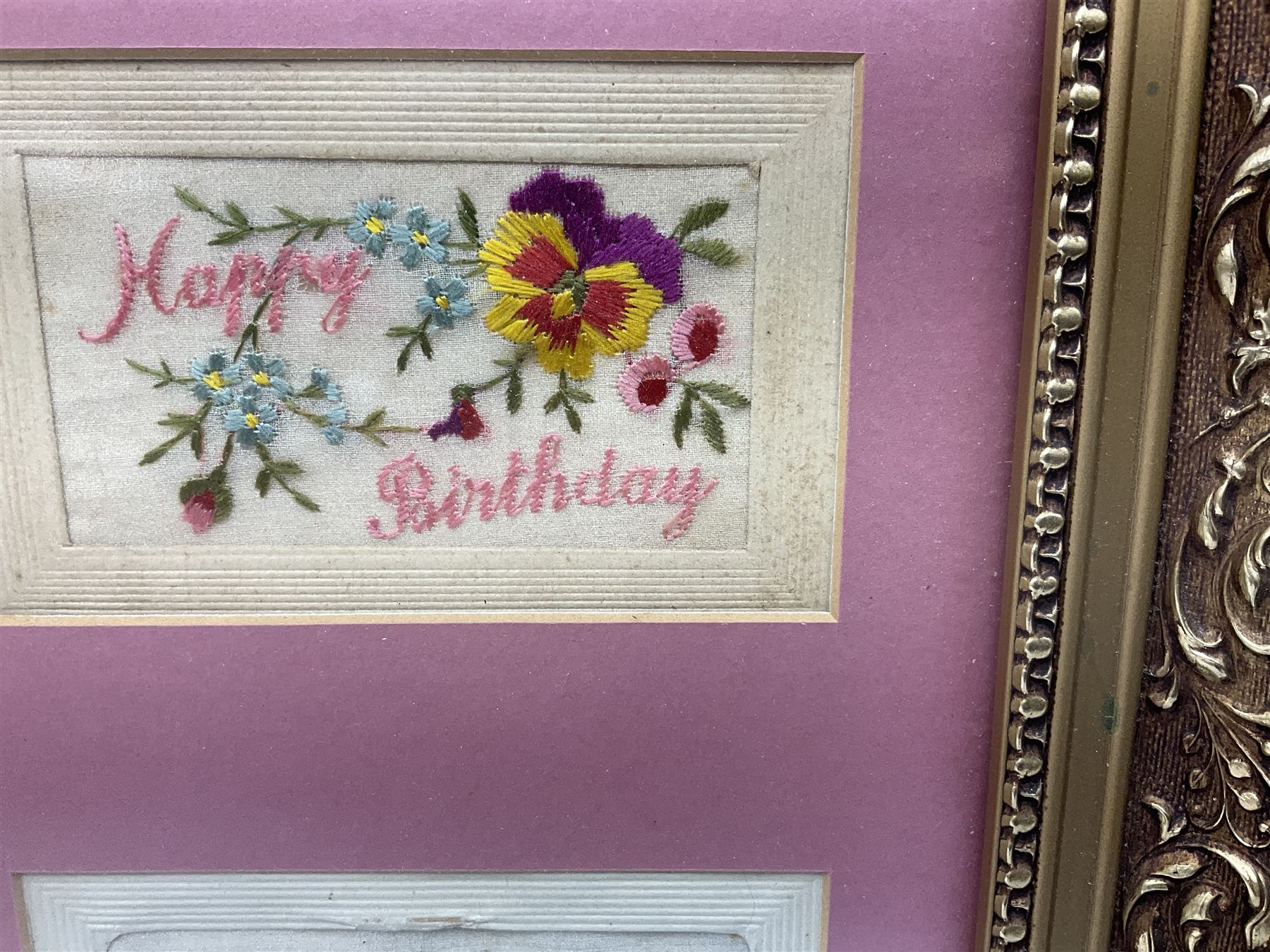 Thirty-five WW1 embroidered silk postcards including regimental crests, flags of the Allies, envelope type with greeting card inserts, Christmas and birthday cards etc; mounted and glazed in three graduated modern matching gilt frames (3)