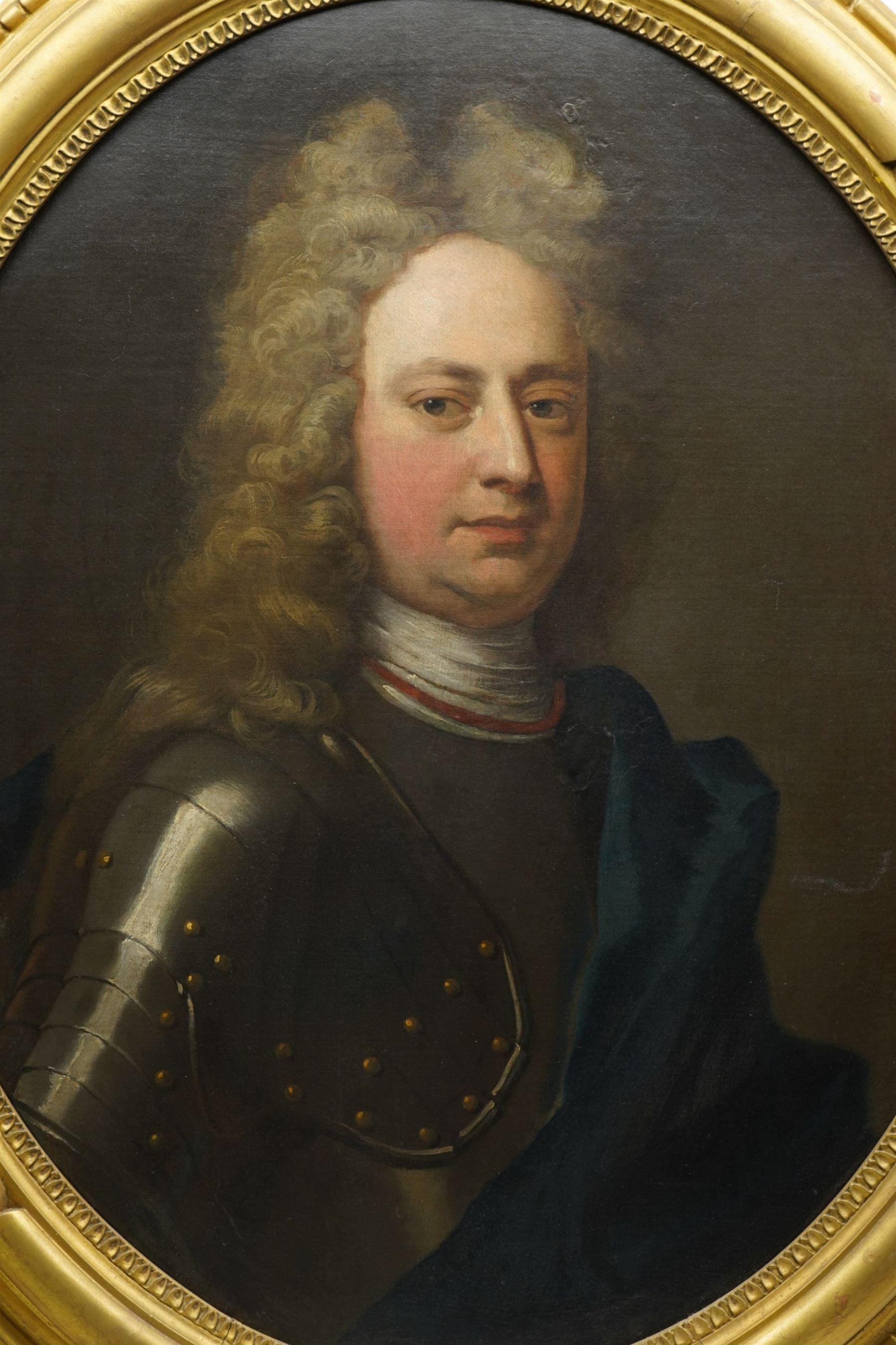Attrib. Sir Godfrey Kneller (German/British 1646-1723): Portrait of John Churchill - 1st Duke of Marlborough wearing a Suit of Armour and Navy Sash with Full-Bottomed Wig, early 18th century oval oil on canvas unsigned, remains of 19th century sale catalogue verso 74cm x 60cm
Notes: the remains of the sale catalogue from which this was purchased in the 19th century reads: 'KNELLER - The Duke and Duchess of Marlborough - a pair - ovals'. The blue sash is indicative of the Order of the Garter.