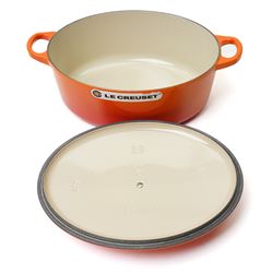 Le Creuset oval casserole dish and cover,  and another shallow example, in the Volcanic colourway