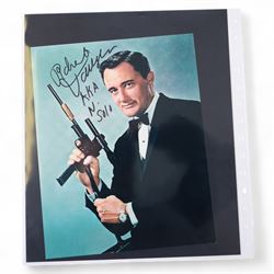 Collection of signed stills and promotional photographs, mostly Sci-Fi TV and film related, including Andy Serkis, Warwick Davis, James Earl Jones, Leroy James, Leonard Nimoy, Billy West, Robert Vaughn, Shane Rimmer, Ethan Phillips etc, all with certificates of authenticity, contained within dark green album