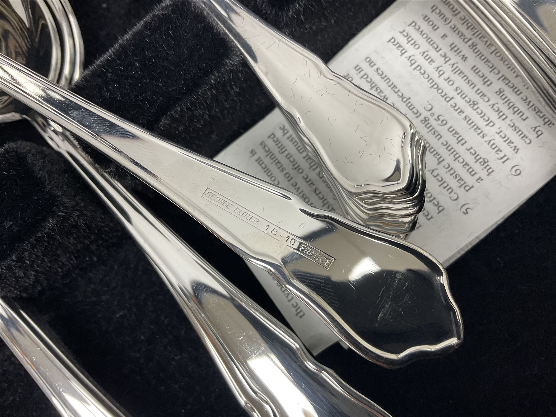 George Butler of Sheffield canteen of stainless steel cutlery in fitted case, W38cm