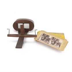Wooden stereoscope and a collection of stereoscope cards, including views of English and W...