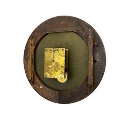 Winterhalter and Hoffmeier -  German oak cased early 20th century fusee wall clock, with a circular wooden surround and a spun brass glazed bezel to the dial, housed on an integral carved bracket with shaped corbel supports, painted dial with Roman numerals, minute track and steel spade hands, dial pinned directly to a four pillar chain driven fusee movement with a recoil anchor escapement. With pendulum and key. 
German fusee movements by Winterhalter and Hoffmeier are comparatively rare, especially housed in carved wall clocks of this description. 