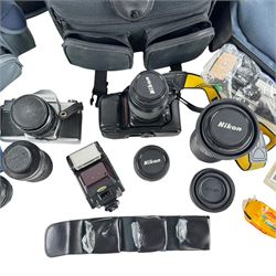 Nikon F50 and  Praktica TL1000 camera bodies, together with lenses and accessories, including Nikkor AF 35-80mm, Nikkor AF 70-210mm, tripod, carry cases, etc