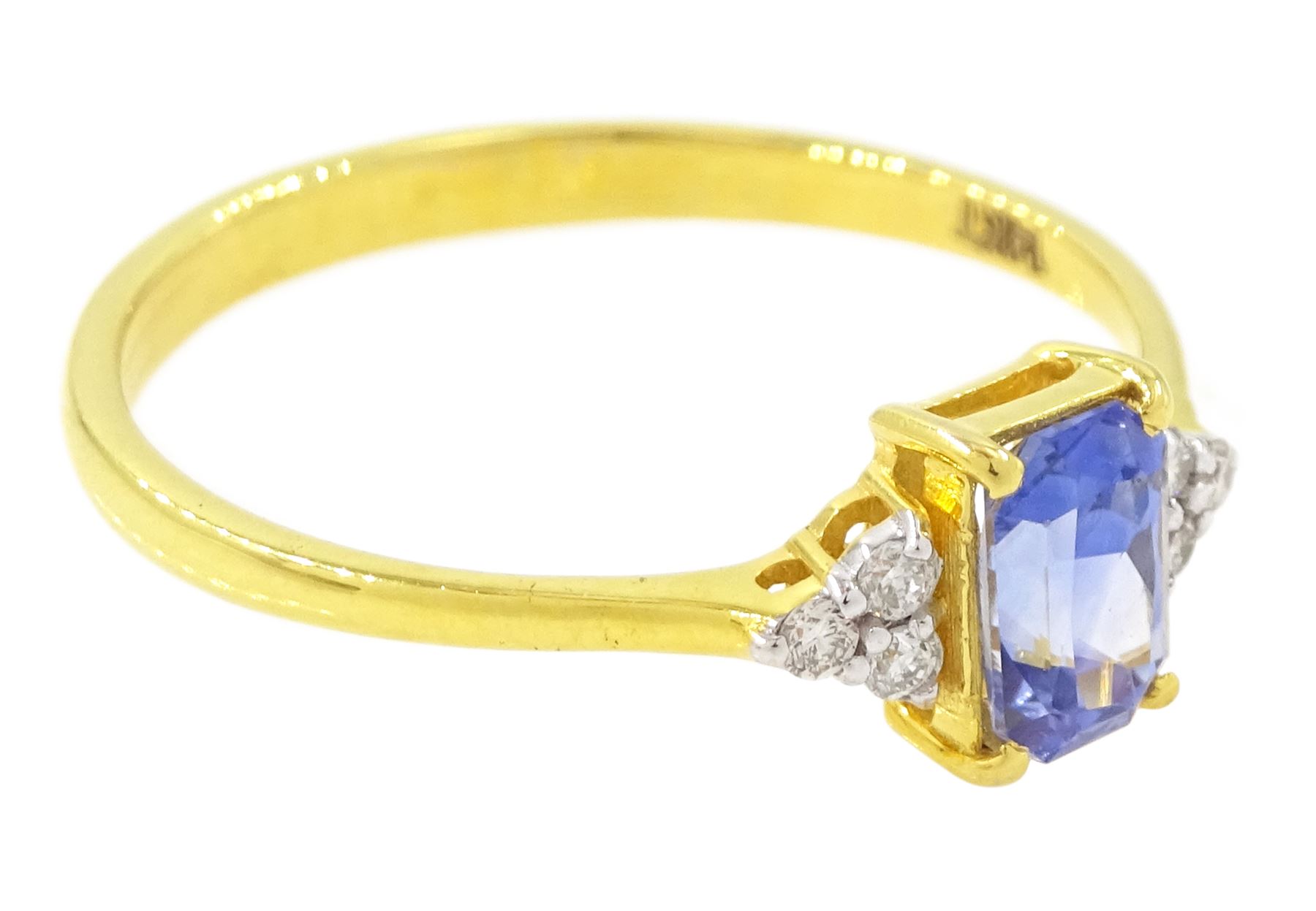14ct gold Ceylon sapphire and diamond ring, single radiant cut sapphire of approx 0.75 carat, with three round brilliant cut diamonds set either side, stamped