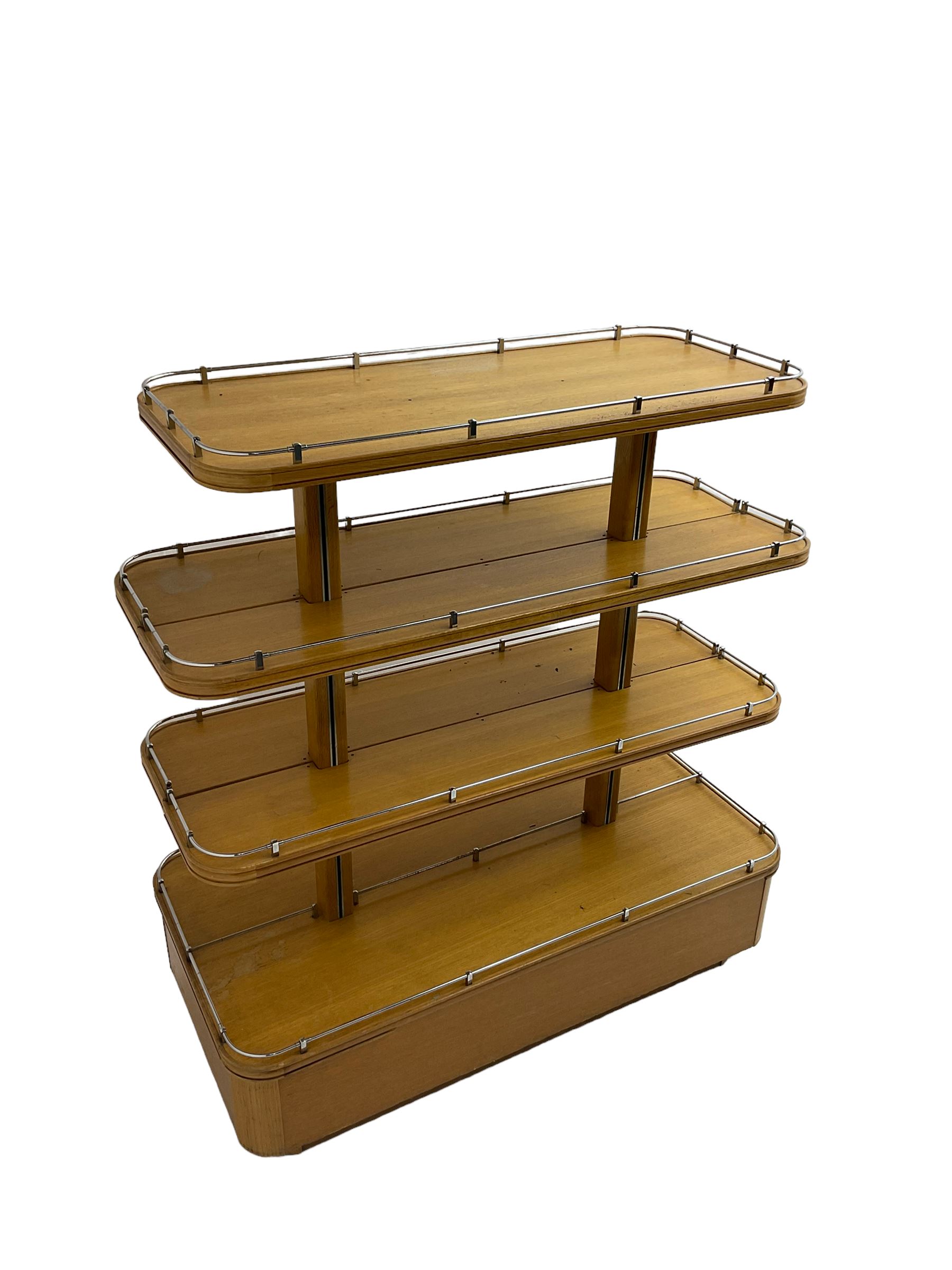 Early to mid-20th century Art Deco design oak shop display stand, fitted with four tiers, the middle two adjustable, with chrome gallery 