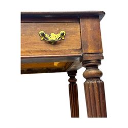 Early 19th century mahogany side table, moulded rectangular top over two drawers, on turned and reeded supports, brass cups and castors 
