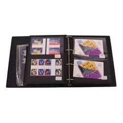 Queen Elizabeth II mint decimal stamps in four folders, face value of usable postage approximately 650 GBP