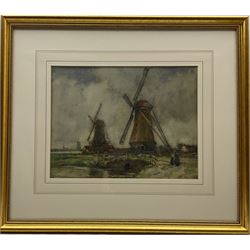 George Graham (British 1881-1949): Windmills in Holland, watercolour signed and dated 1913, 26cm x 34cm
