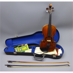  Late 19th century German violin c1890 with 36cm two-piece maple back and ribs and spruce top, bears manuscript label 'Joseph Guarnerius fecit Cremona anno 1739', L59.5cm overall, in later carrying case with two bows  