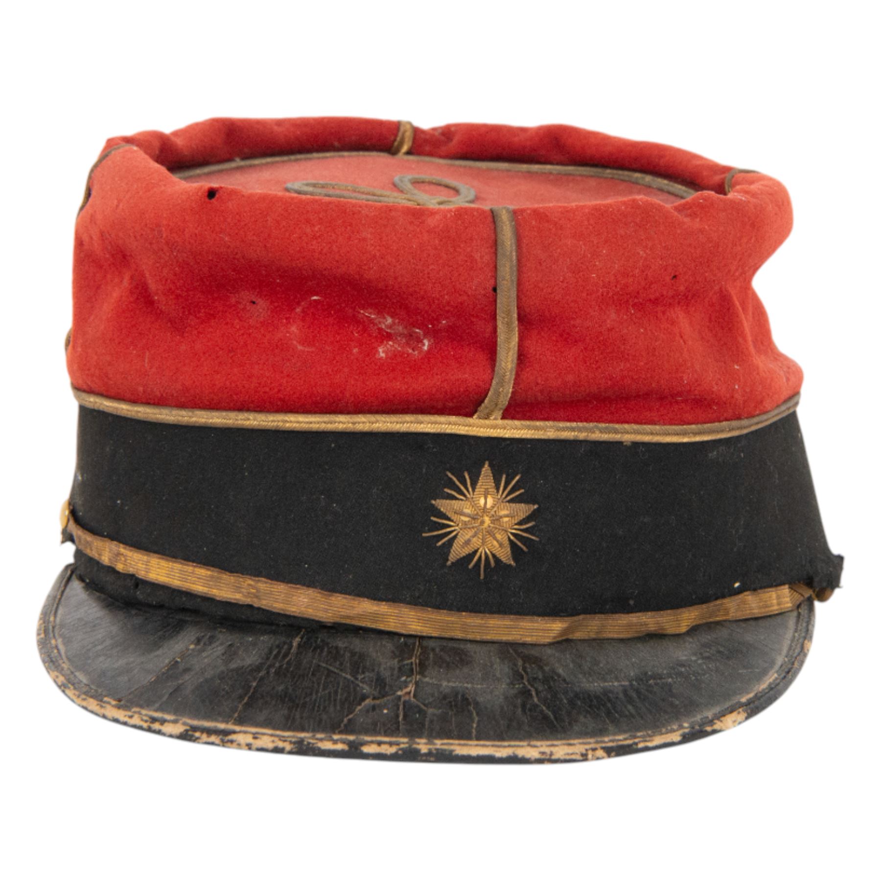 WWI French Administration Officer's kepi, 1914, the body in red wool with gilt piping and bullion wire woven star the front