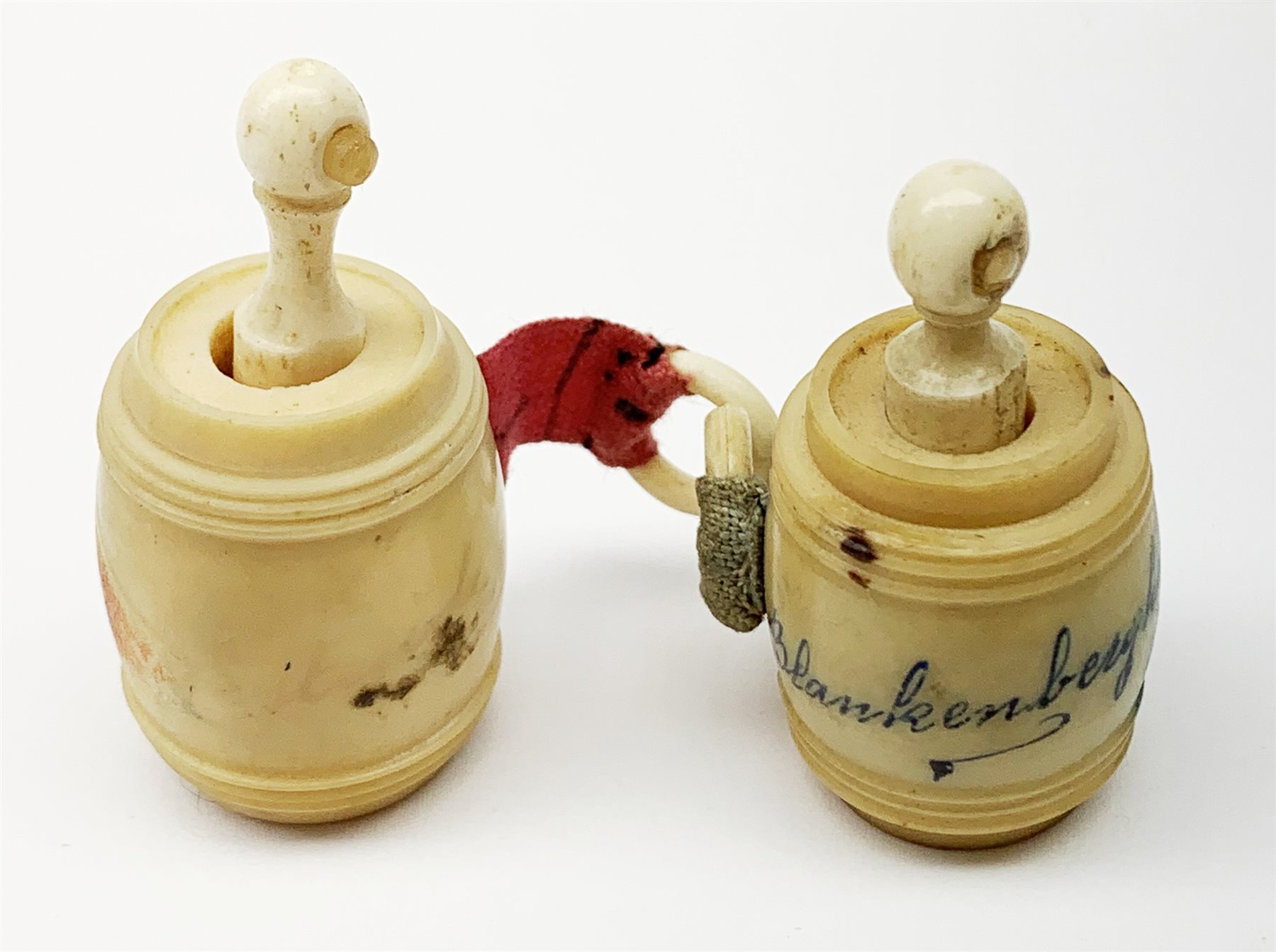 Two Victorian bone Stanhope pens with letter opener terminals, together with two further bone Stanhope pens (a/f), and two Victorian vegetable ivory Stanhope barrel tape measures. 
