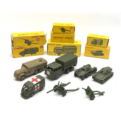 Dinky - seven military vehicles comprising Armoured Command Vehicle No.677, 5.5 Medium Gun No.692, 25-Pounder Field Gun No.686, French Camion Militaire Berliet Tous Terrains No.80D, French Engin Blinde De Reconnaisance Panhard No.80A, French Char A.M.X. 13 Tonnes No.80C and French Ambulance Militaire Renault-Carrier No.80F, all boxed (7)
