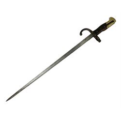 French 1874 pattern epee gras bayonet, the 52cm T section steel blade marked to the spine for the St Etienne arsenal 1877, the hilt with brass pommel, wooden grips and rivets, 84508 stamped on quillon, overall length 64cm