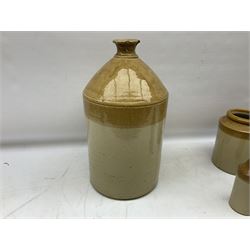 Stoneware flagon stamped H.P Woodford Wine and Spirit Merchant Gravesend, together with stoneware bottle stamped Least Louth and three stoneware jars, flaggon H42cm