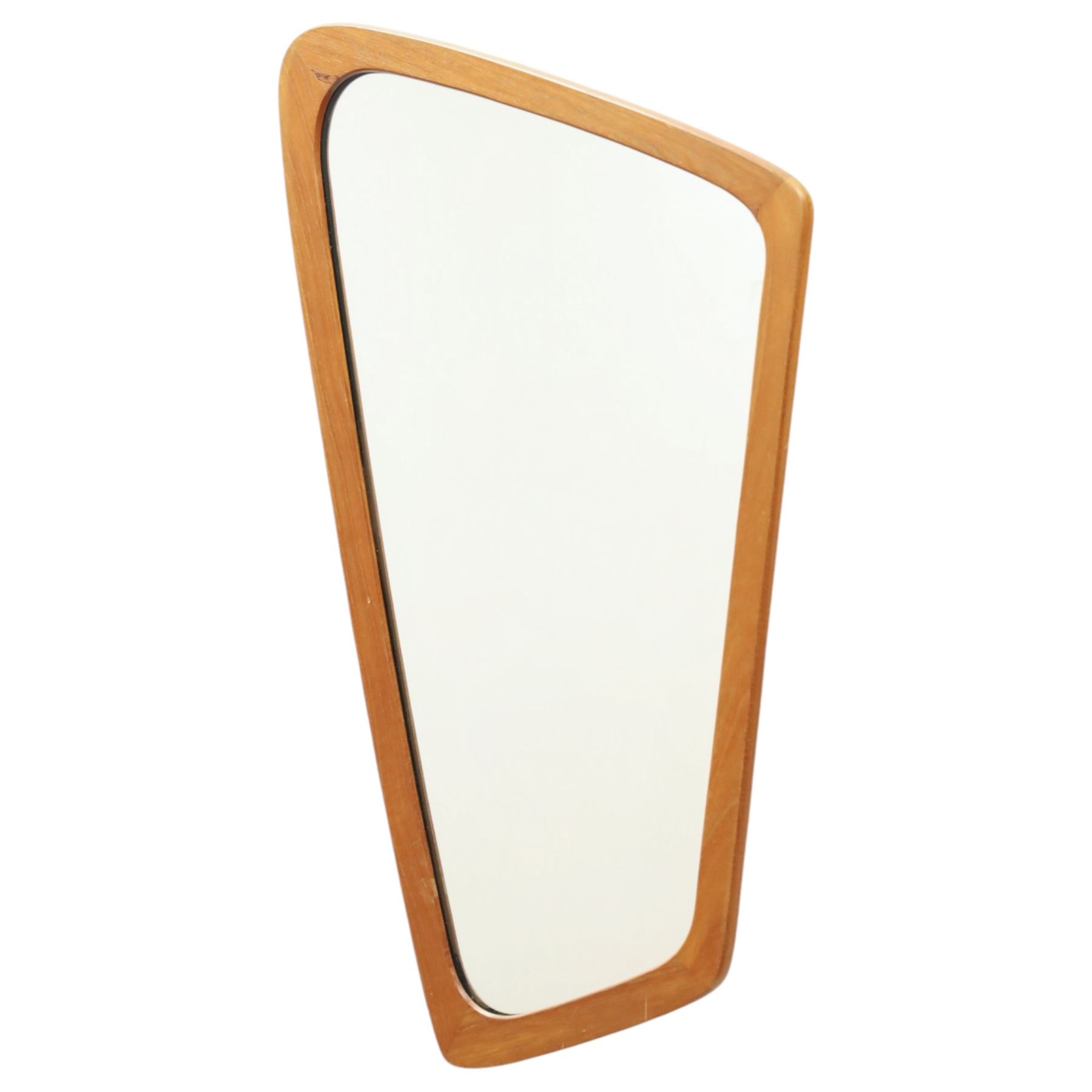 Mid 20th century Danish teak framed asymmetric mirror, stamped 'Made in Denmark' on the back