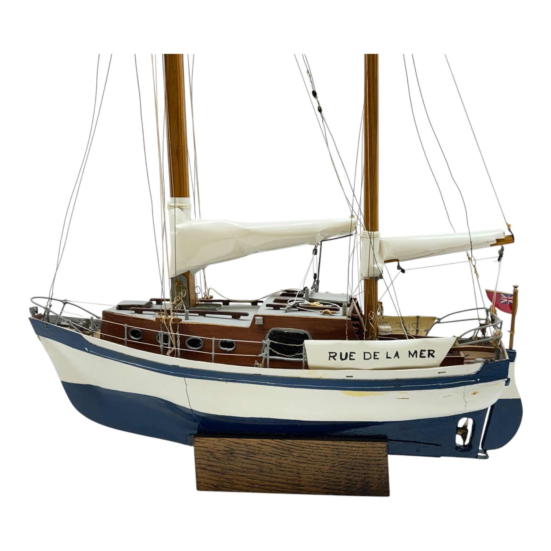 Scratch built model yacht 'Rue de la mer', with painted blue and white hull, with acrylic case, model H67.5cm