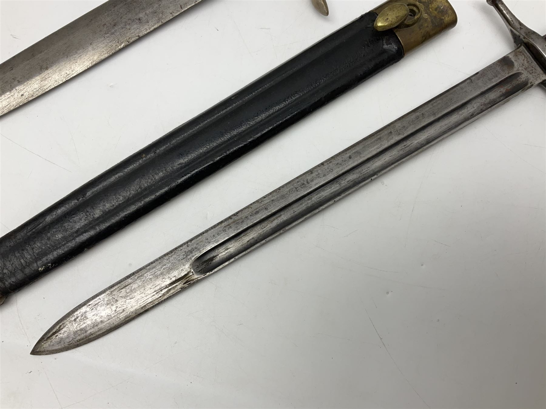 Italian Model 1891 bayonet with 30cm fullered blade; the crosspiece marked 'TERNI'; in associated brass and leather scabbard L43cm overall; and Knights Templar (?) short blade sword (no scabbard) (2)