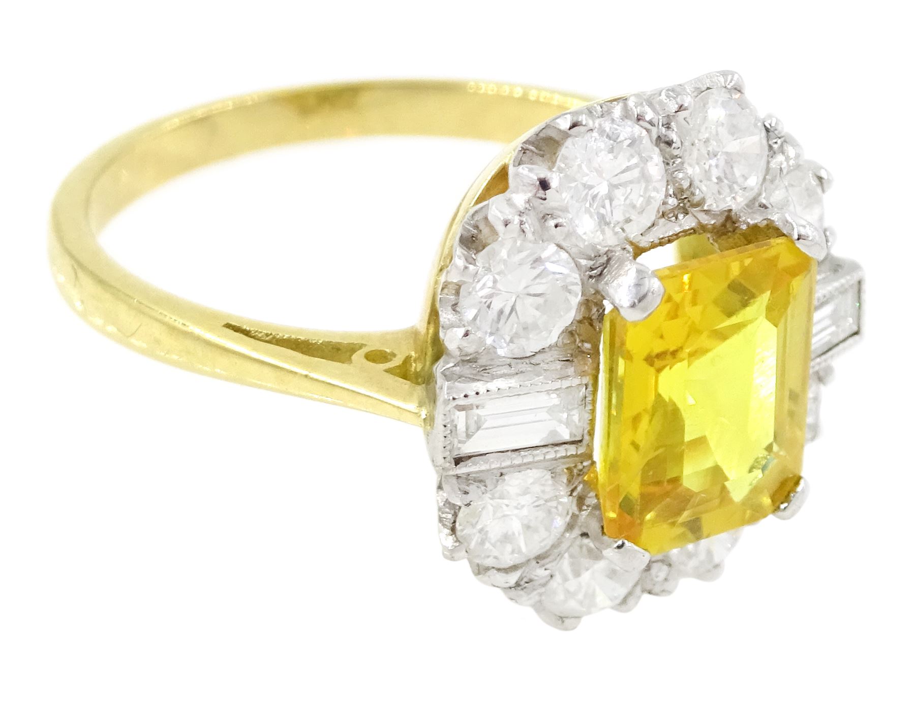 18ct gold yellow sapphire and diamond cluster ring, single octagonal cut yellow sapphire of approx 2.15 carat, surrounded by eight brilliant cut diamonds and two baguette cut diamonds within a milgrain setting, stamped, total diamond weight 1.2 carat