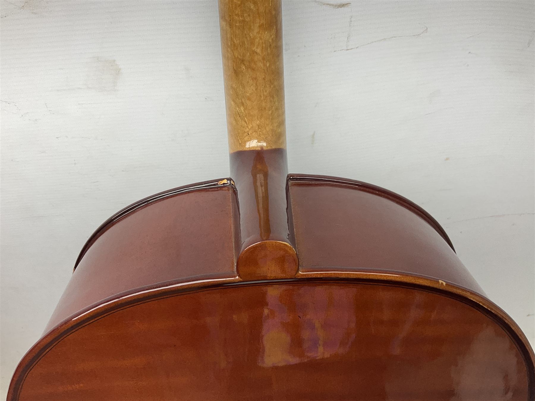 Modern Hungarian half-size cello with 69cm two-piece maple back and ribs and spruce top L114cm overall; and Stentor half size cello bearing label 'The Stentor Student II'; each in soft carrying case (2)