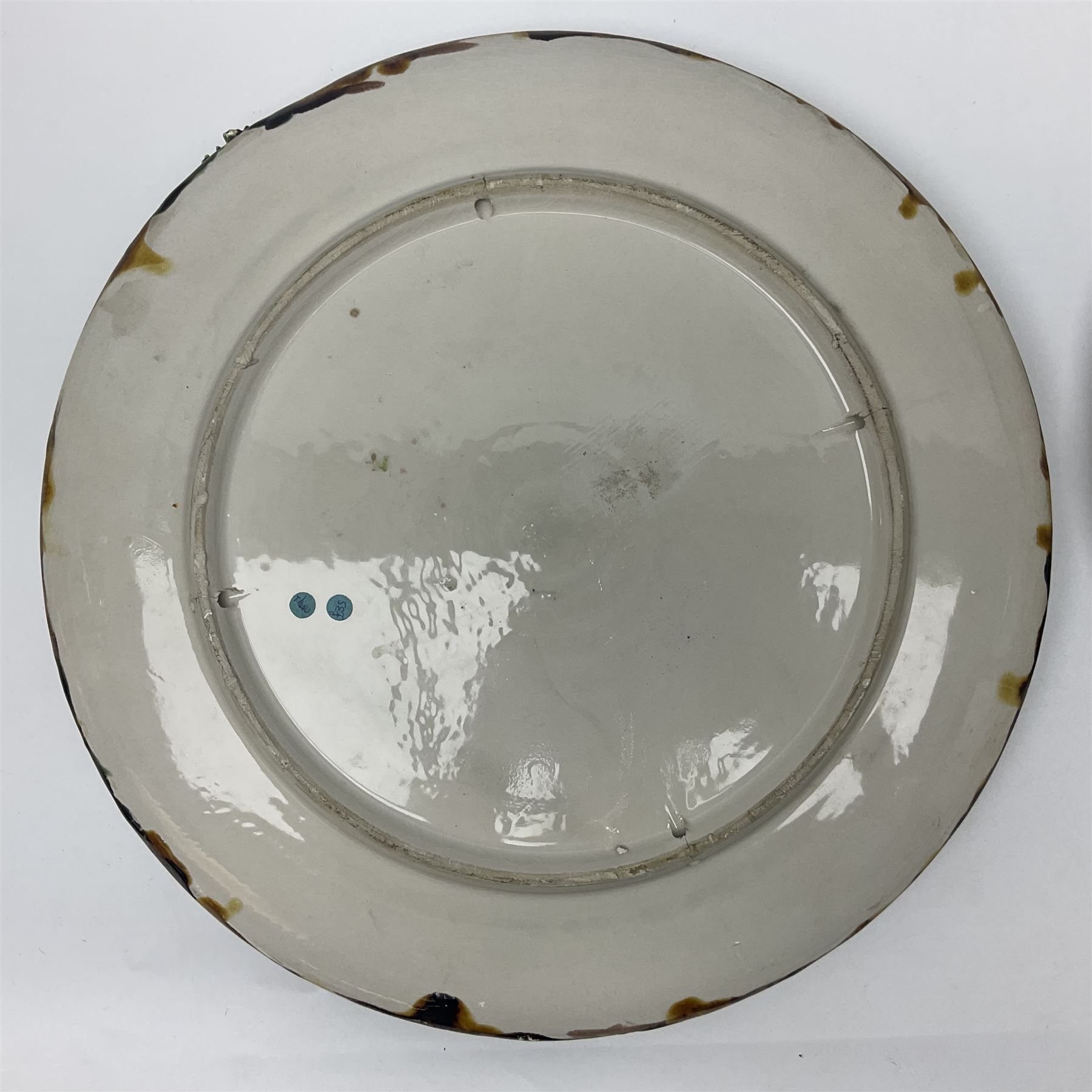 Two 20th Century Portuguese Palissy style Majolica wall plates, one depicting a crab, the other a lobster each to the centre modelled in relief surrounded by encrustations and shells, both with impress marks beneath, D32cm