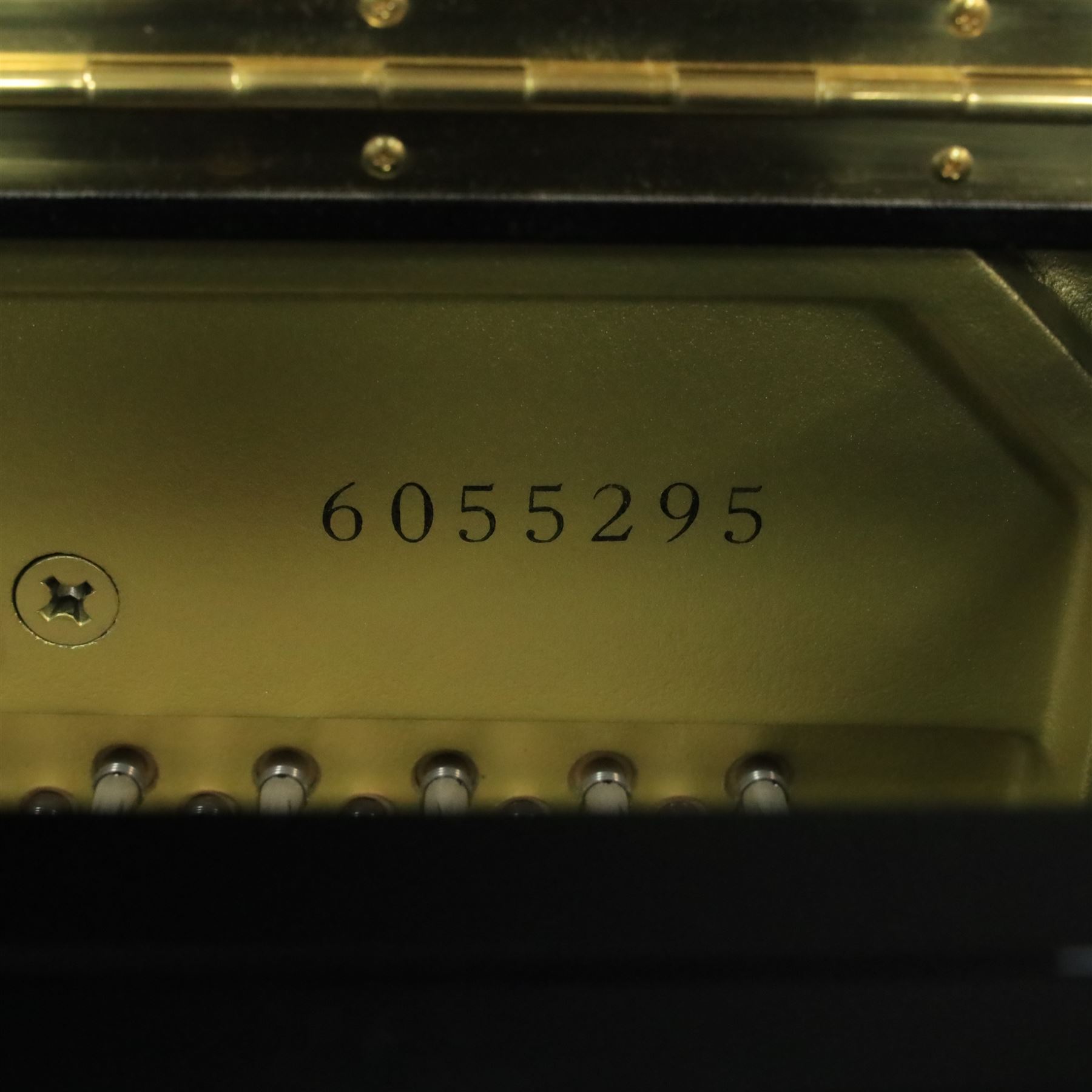 Yamaha model U5 upright piano retailed by Harrods, 88 keys and three pedals within high gloss ebonised case, serial no. 6055292, with Roland black button top piano stool