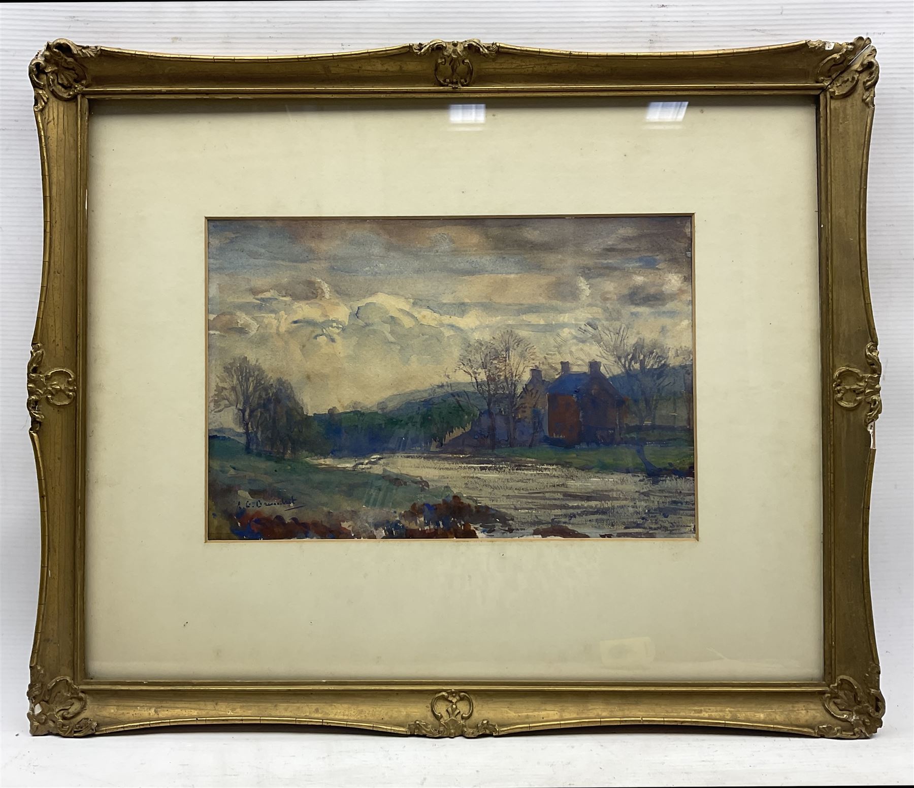 Reginald Grange Brundrit RA ROI (British 1883-1960): View of a House from the Riverbank, watercolour signed 22cm x 33cm 