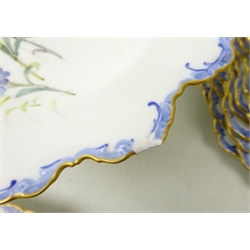  Early 20th century Royal Crown Derby dessert service, decorated with English flowers within a shaped moulded borders painted with ribbons comprising twelve plates, comport, two square and two oblong dishes (17)  