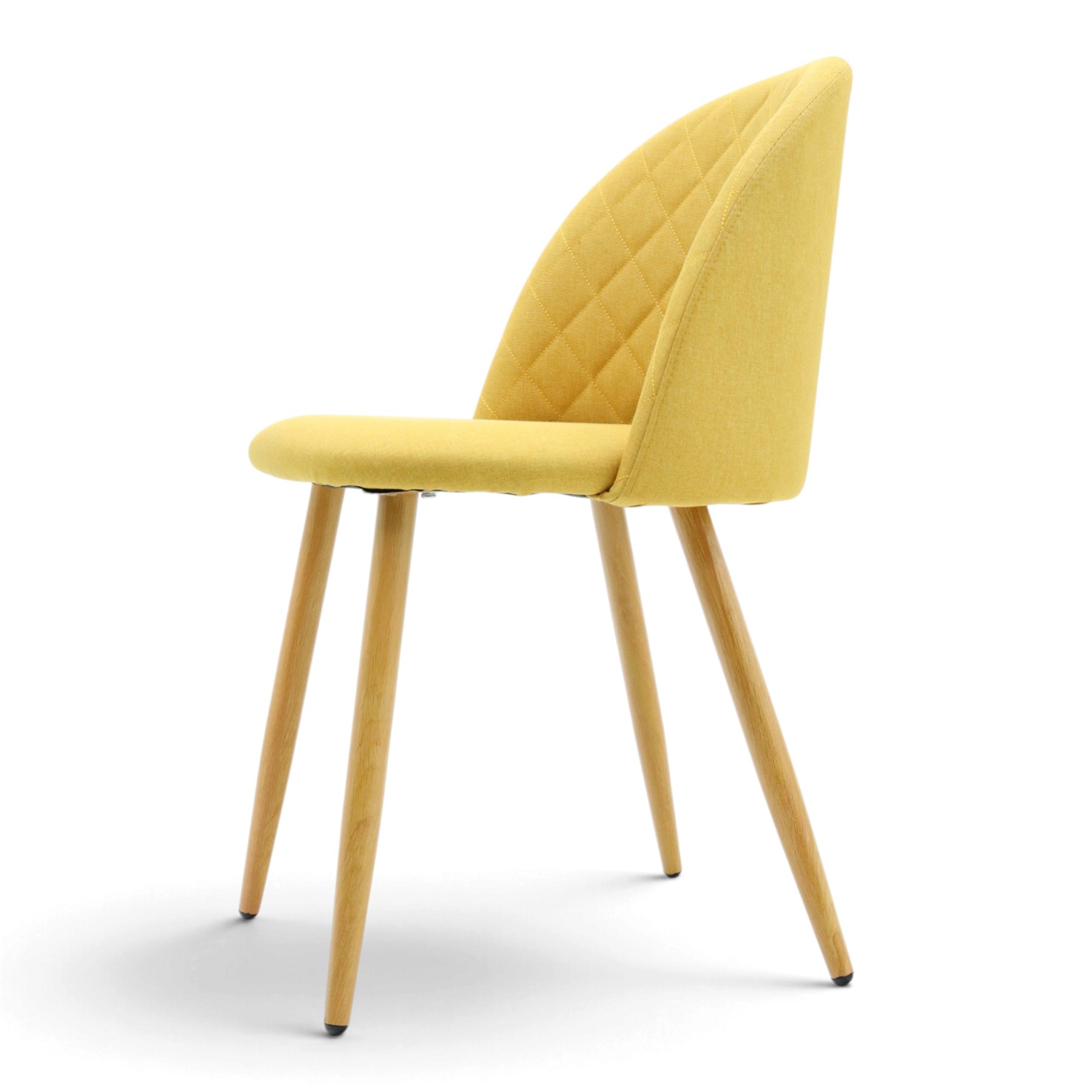Set of four contemporary yellow upholstered dining chairs, with wrap around back with quilted stitching, padded seat raised on light oak tapering supports 