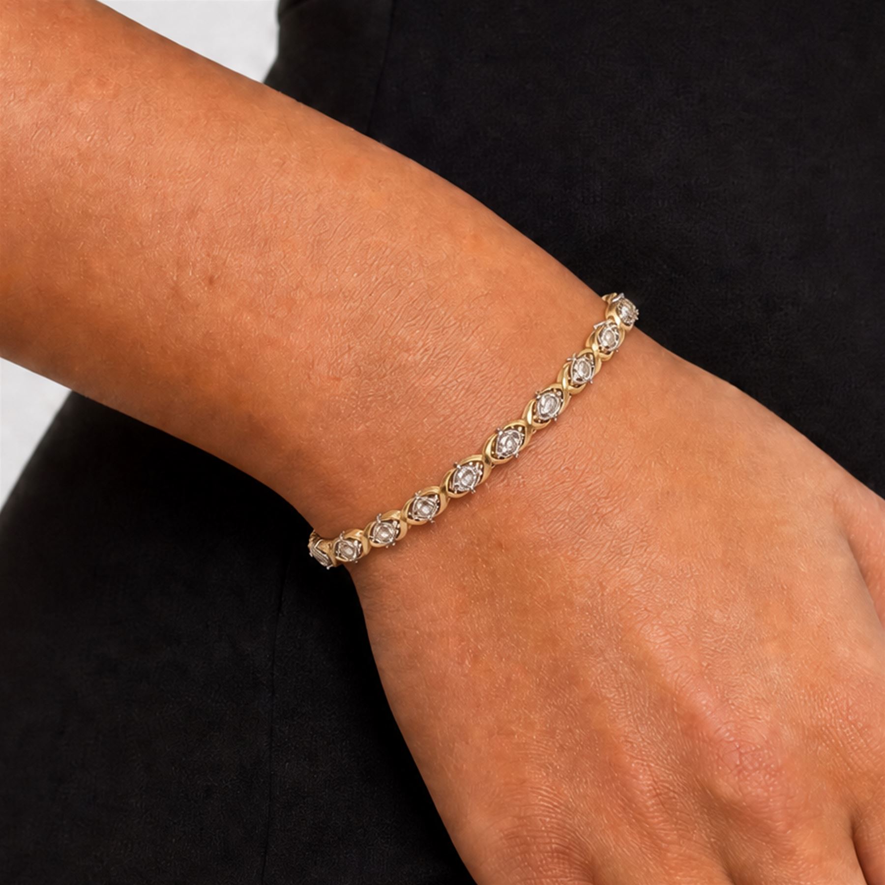 14ct white and yellow gold diamond fancy link bracelet, set with thirty-eight round brilliant cut diamonds, stamped, total diamond weight approx 1.15 carat