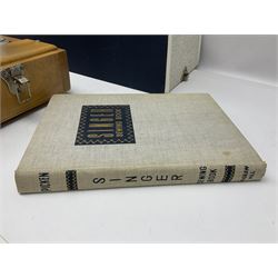 Seamstress sewing machine in case, together with a Singer sewing book