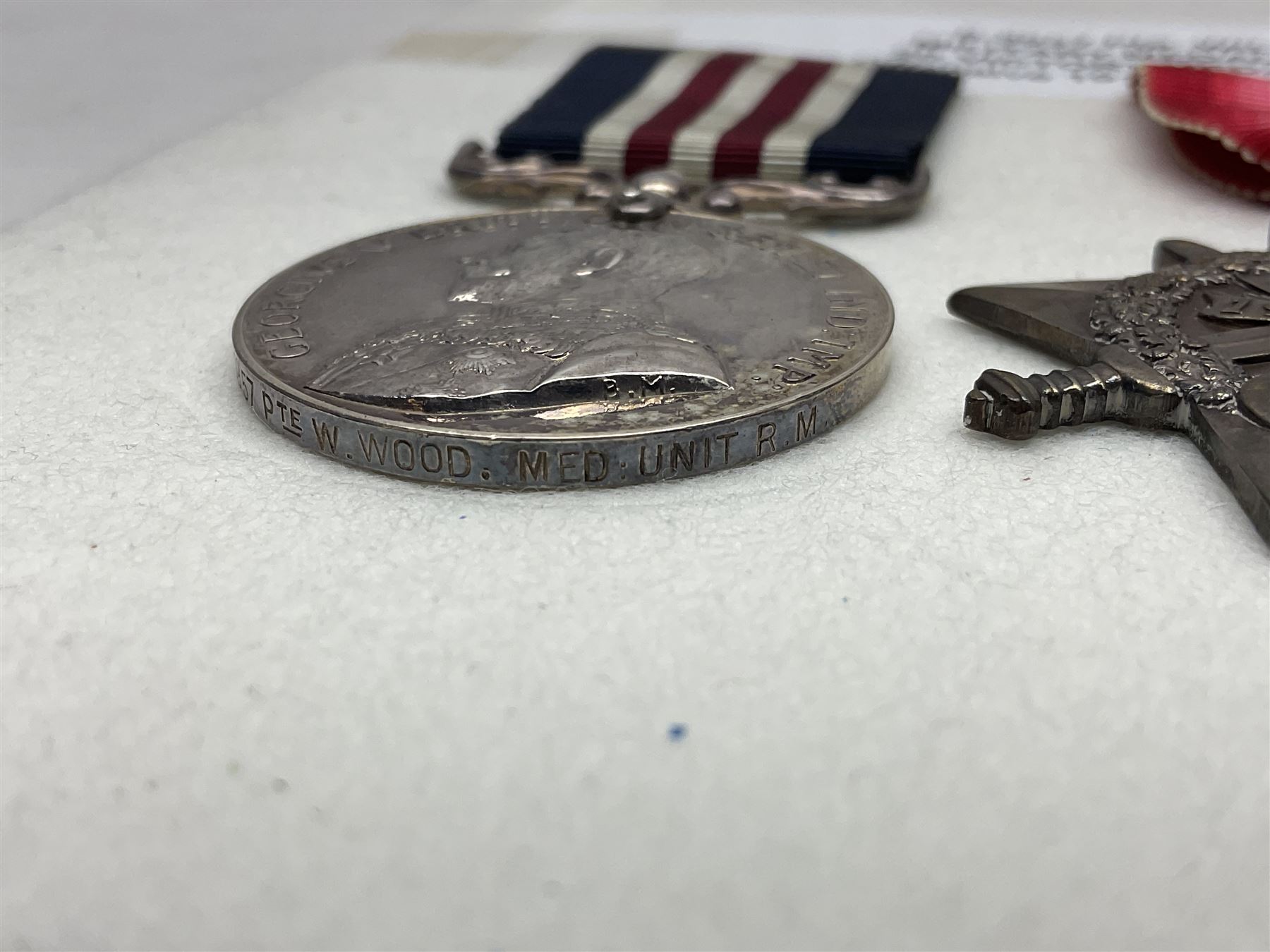 WWI Military Medal awarded to S-3957 Pte. W. Wood Med. Unit R.M. as reported in the London Gazette 14th May 1919 for services at 'the British Offensive 1918 Drocort-Queant Line and subsequent Operations' with archive of research information and original bill of purchase from Spink & Son dated 5/9/1957; together with a WWI group of three medals comprising British War Medal, Victory Medal and 1914-15 Star awarded to 1732 Pte. D. Newton R.A.M.C.