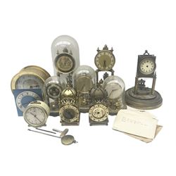 An assortment of 400-day torsion clocks for repair or spare parts.
