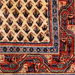 West Persian Boteh-Mir hand-knotted rug, ivory field densely decorated with a repeating lattice of of small boteh motifs arranged in diagonal rows enclosed by a broad border of stylized geometric devices and angular floral ornament between multiple guard stripes with cotton fringe ends 
