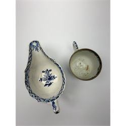 18th century Bow coffee cup, decorated in a version of the Mansfield pattern, circa 1760, H5.5cm, together with an 18th century blue and white cream boat, probably Bow, decorated with floral sprays and sprigs, L14cm