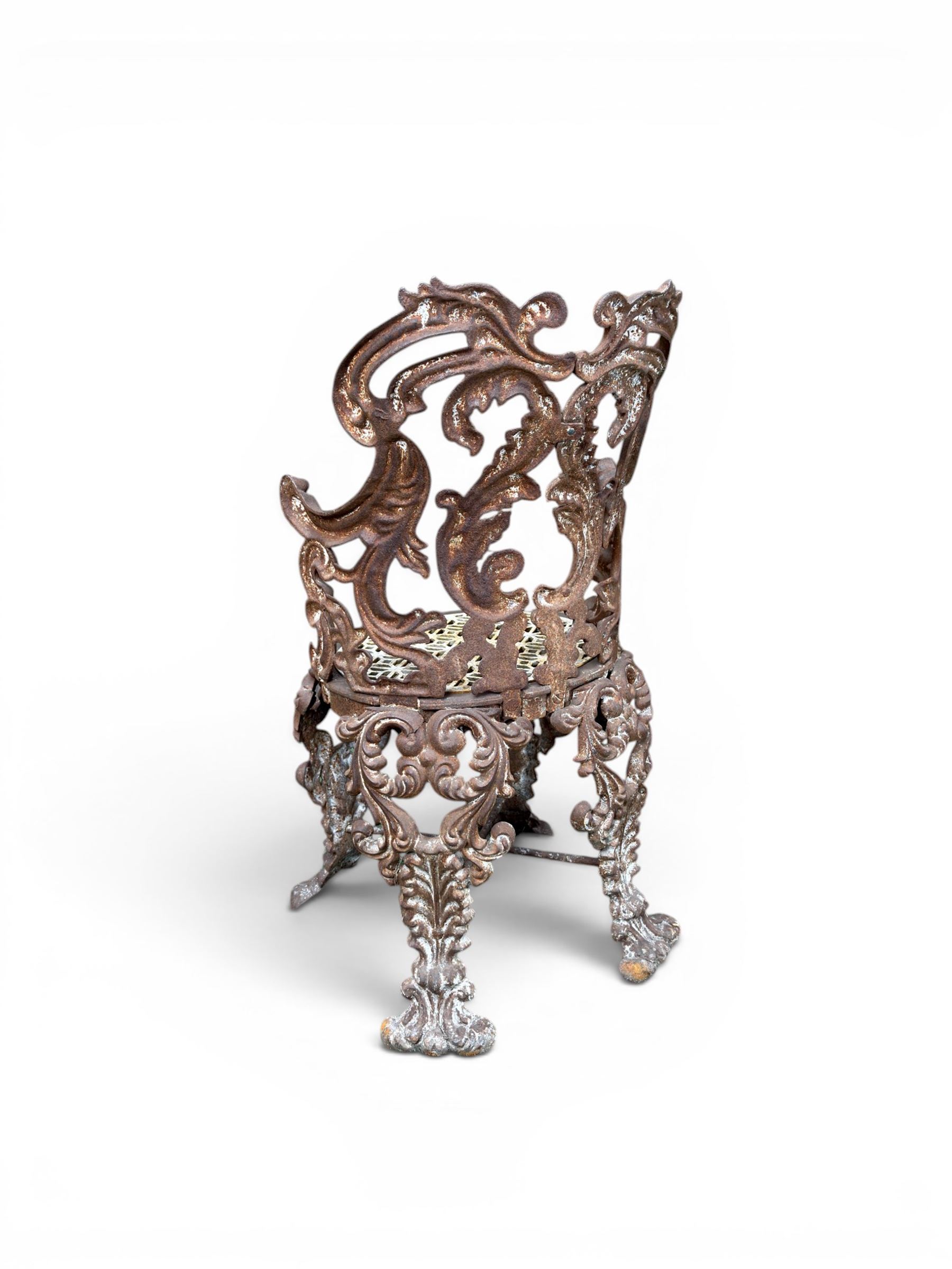 19th century Rococo Revival cast iron garden chair, pierced back comprised of scrolling acanthus leaves, over a pierced geometric white painted drop-in seat, raised on four acanthus and anthemion shaped cabriole supports united by X-frame stretcher