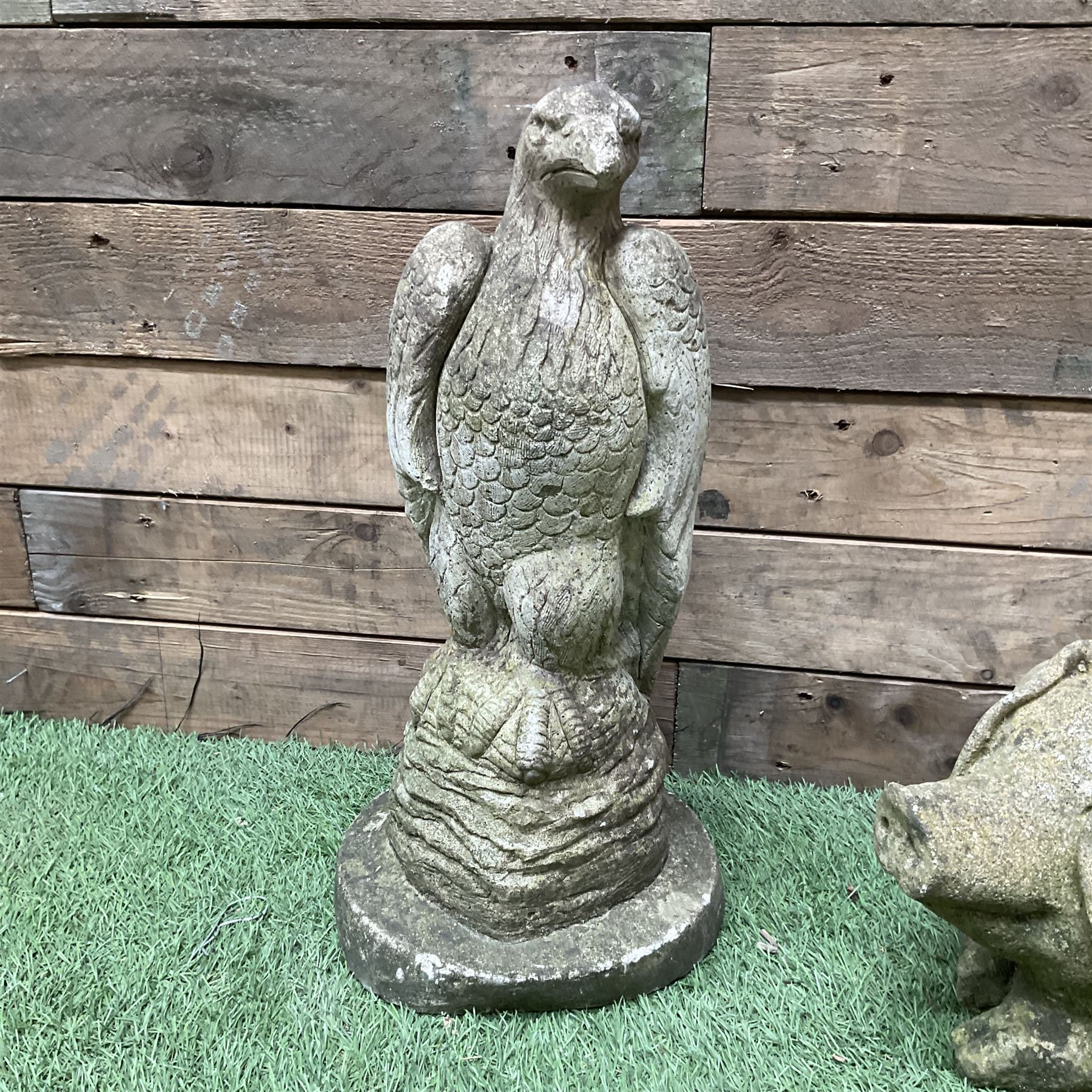 Cast stone pig and eagle garden ornaments  - THIS LOT IS TO BE COLLECTED BY APPOINTMENT FROM DUGGLEBY STORAGE, GREAT HILL, EASTFIELD, SCARBOROUGH, YO11 3TX