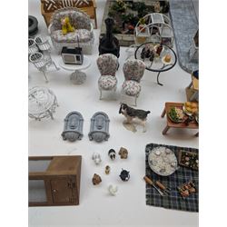 1:12 scale dolls house conservatory and garden accessories, including white wooden glazed conservatory on a stone effect base, black and white metal garden seating, barbecue, plant shelves, parasol, barbeque accessories, large planters, rabbit hutch, animals, chimenea, etc