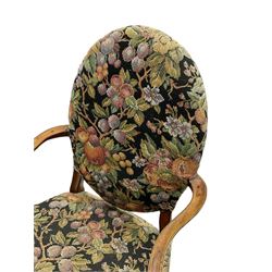 Pair of George III mahogany framed open armchairs, oval back and serpentine seat upholstered in fruit and foliage patterned fabric, shaped and moulded arms and arm supports, on square tapering moulded front supports 